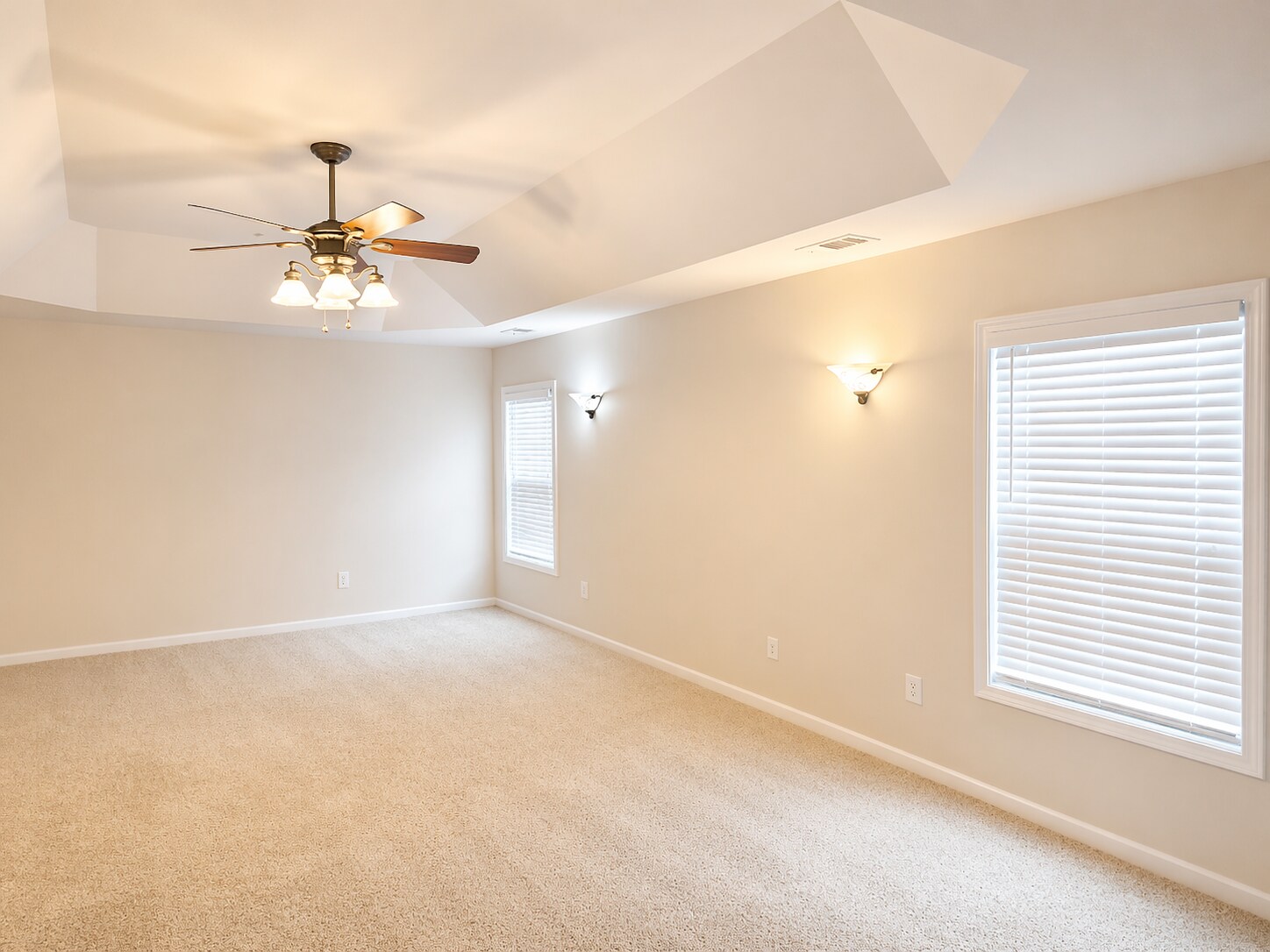 Primary bedroom featuring dual closets for ample storage. - 2143 Somerset Pl SE