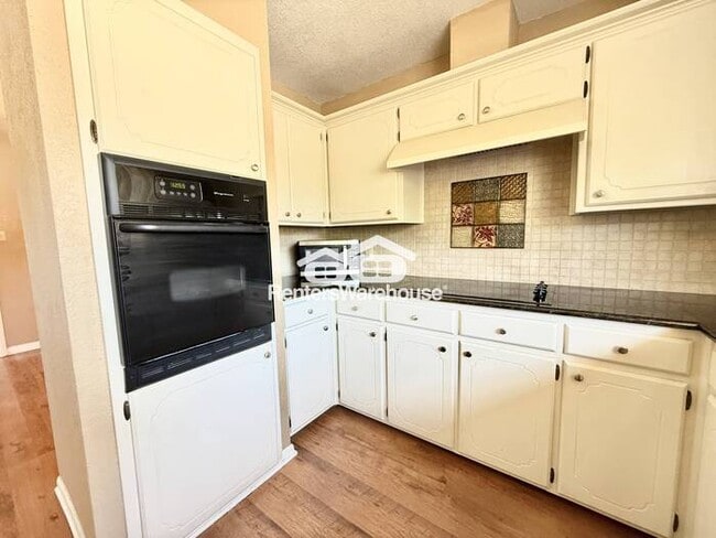 Building Photo - Spacious Corner-Lot Home with Cozy Charm a...