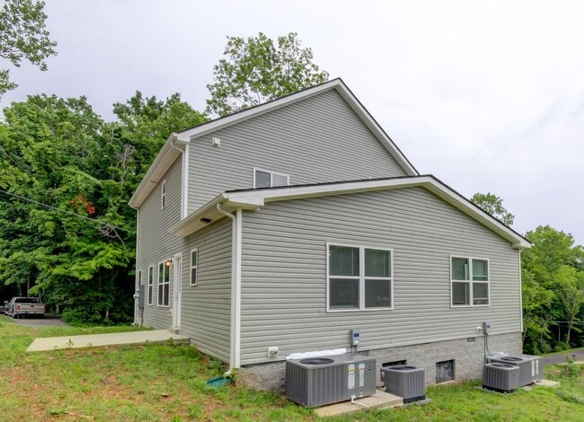 Building Photo - Two Story Duplex With Hardwood Flooring and White Cabinetry