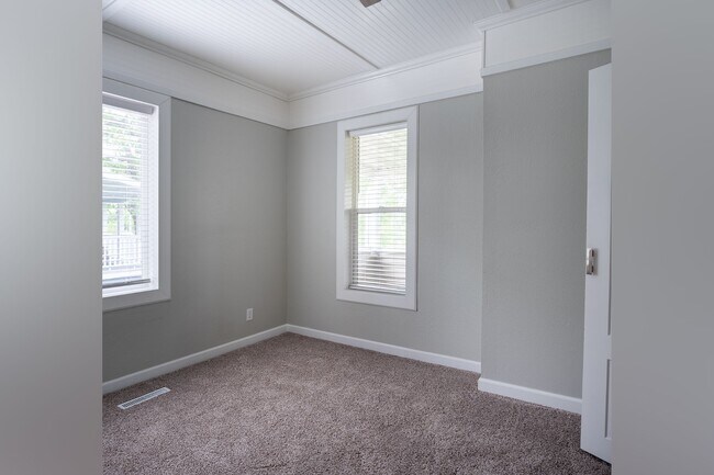 Main floor bedroom. - 222 6th Ave SE