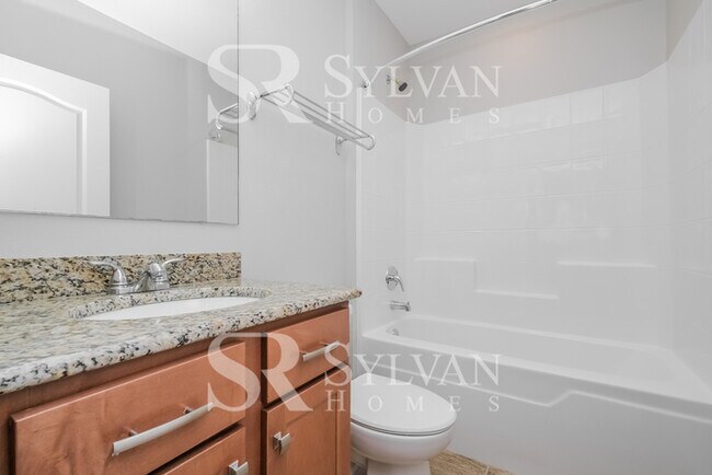 Building Photo - Feel welcome and comfortable in this charming home