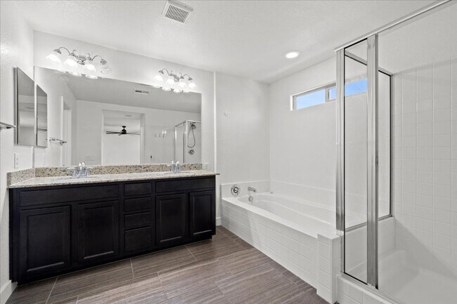 Building Photo - Modern Gated 3 Bedroom Retreat with Loft & Entertainer’s Backyard