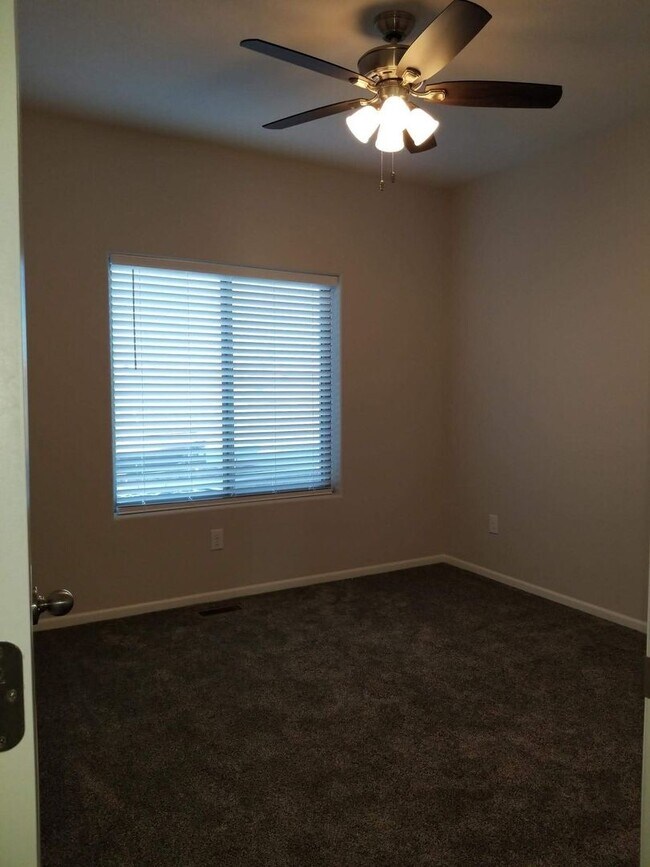 Building Photo - Daylight ranch townhome with 2 stall garage.  Private driveway and covered deck. high end finishe...