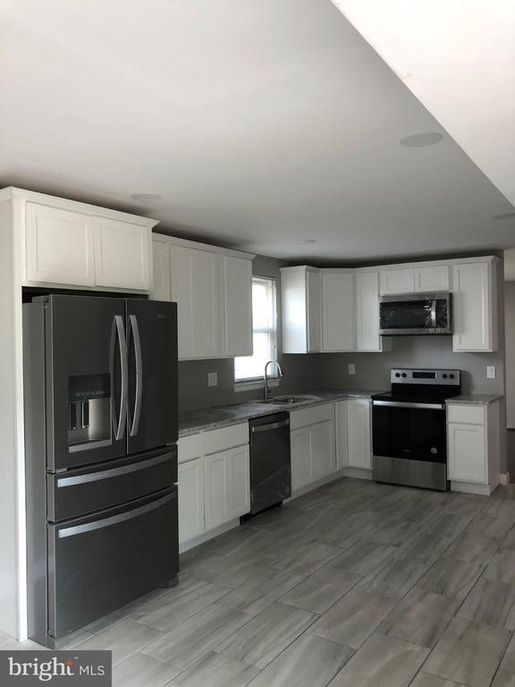 Building Photo - 6031 Flywheel Ct