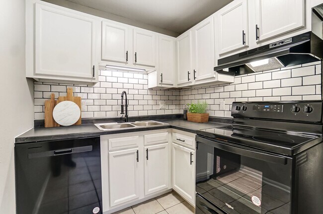 Primary Photo - Renovated 2 Bedroom with Washer + Dryer Av...