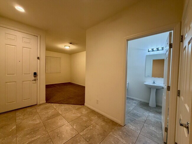 Building Photo - Beautiful 2260sqft 3bed 2.5bath with tile downstairs, carpet in Den & Living Room