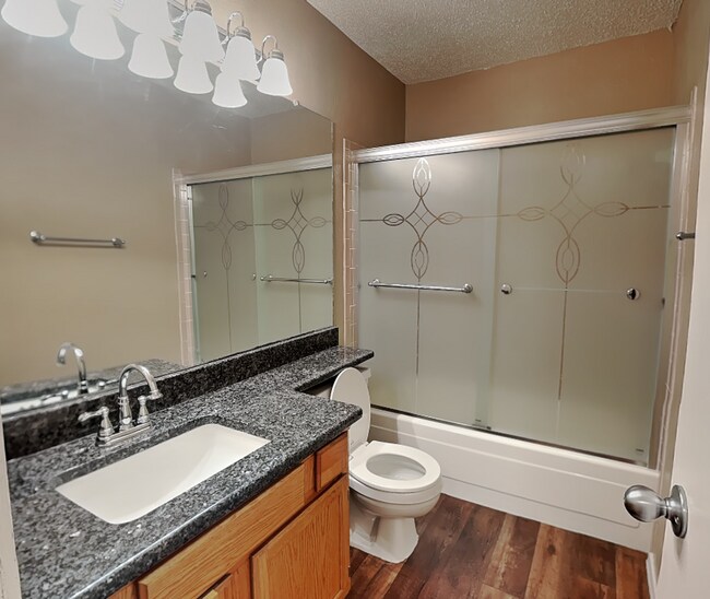 Building Photo - Charming One-Story with Bonus Sunroom & Backyard Retreat in Prime Summerfields Location!