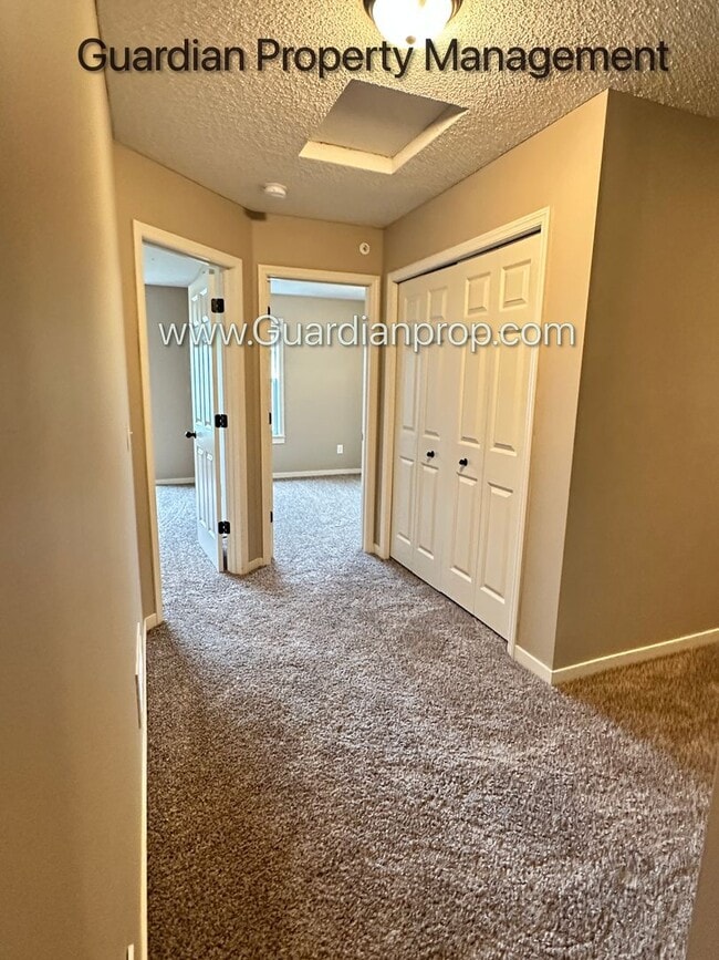 Building Photo - Champlin Town Home, 2 Car Garage, Dishwasher, Washer/Dryer, Balcony, July/Aug 1st Move In