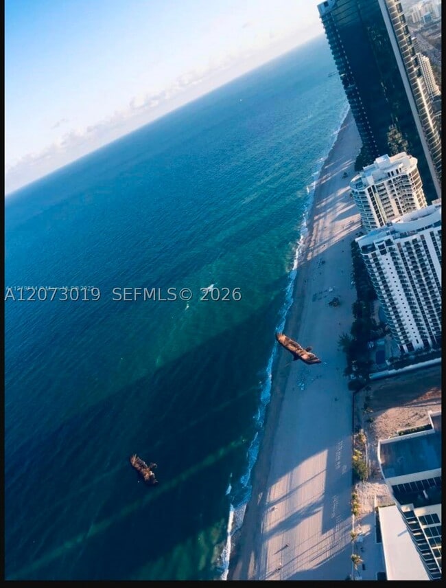 Building Photo - 18975 Collins Ave