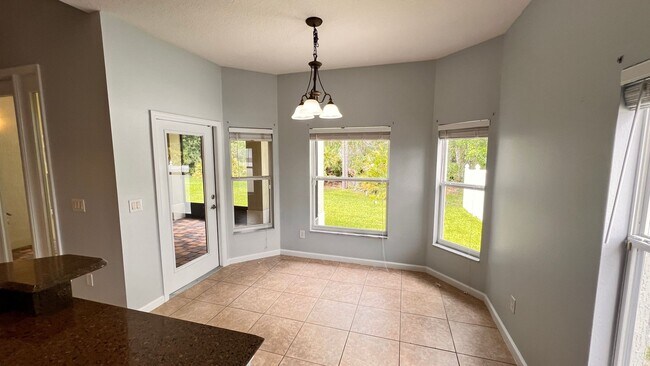 Building Photo - Available NOW! Stunning 4-Bedroom Home in ...