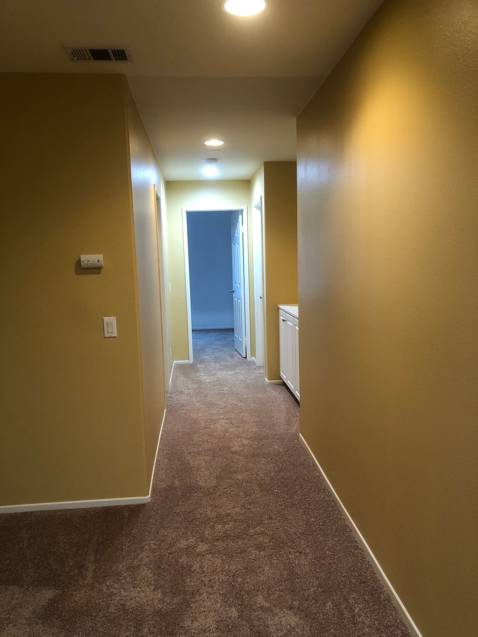 Hallway area going to the bedrooms . - 6395 Delgado Ln