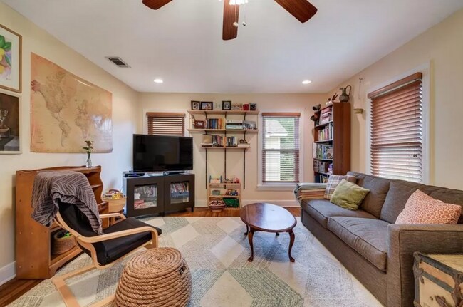 Building Photo - Discover Your Austin Oasis: Revitalized Bungalow with Hardwood Floors and Entertainer's Deck!