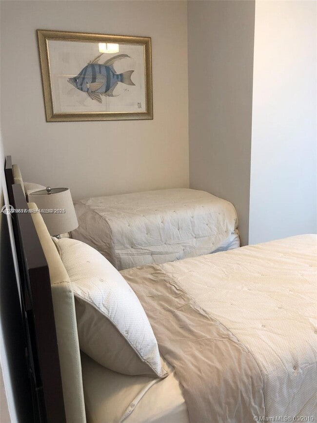 Building Photo - 10203 Collins Ave