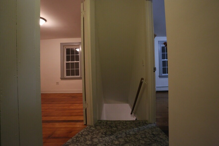 2nd floor facing down stairwell - 1st bedroom on the right, office on the left with outdoor access t - 51 Canal St