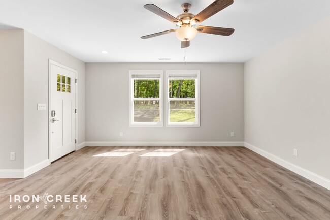 Building Photo - Bright and Modern: New Construction Three-...