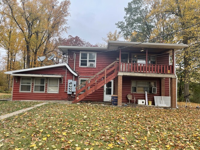 Building Photo - Log Cabin (Triplex)