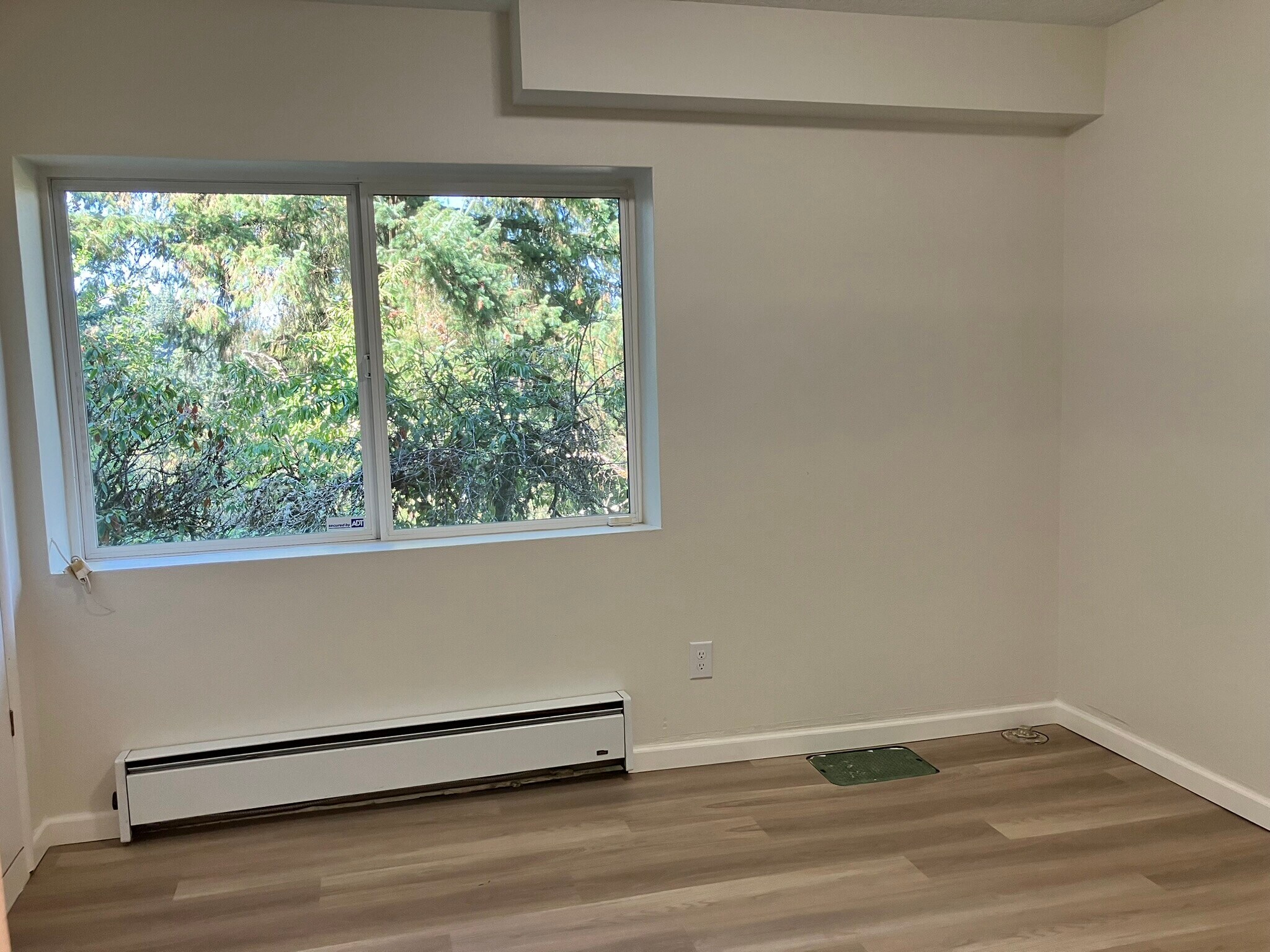 Second bedroom with a large window - 3022 SW 12th Ave