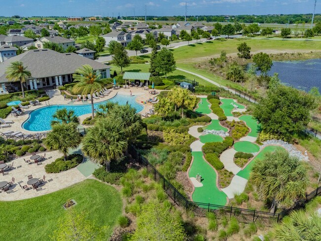 Building Photo - Resort Style Living! Stunning 3/2.5 Townhome in Waterleigh! Available April!