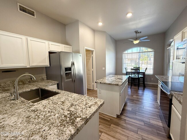 Building Photo - 235 E Smoke Tree Rd