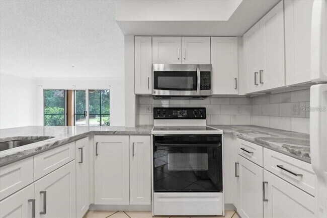 Building Photo - 2400 Feather Sound Dr