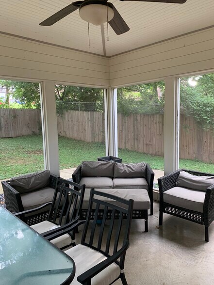 Screened in patio with nice backyard with privacy fence - 1003 Dew St