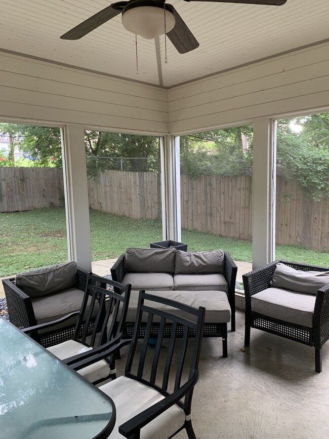 Screened in patio with nice backyard with privacy fence - 1003 Dew St