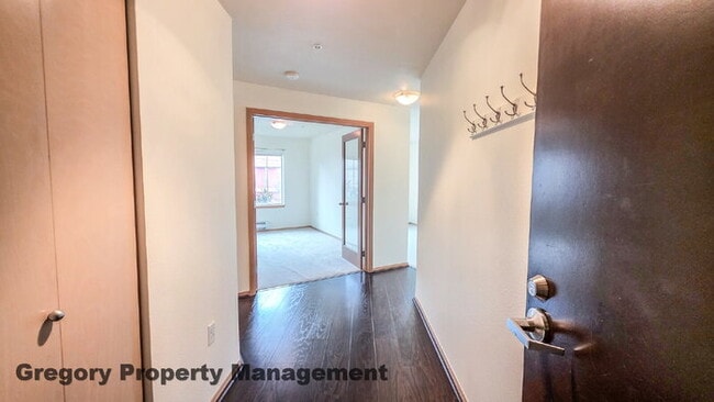 Building Photo - Sunny Capitol Hill 2 BR 1.5 BA Condo with Garage Parking Included & Skyline Views!