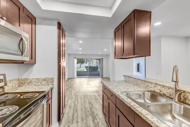 Building Photo - $500 MOVE IN SPECIAL! 2 BD, 2 BA Condo at Mission Plaza! 1000 Sq Ft w/ Great Amenities!