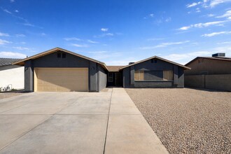 Building Photo - "Charming 4-Bedroom, 2 Bathroom Pool Home in Ocotillo!"
HALF OFF FIRST MONTH'S RENT IF A LEASE IS...