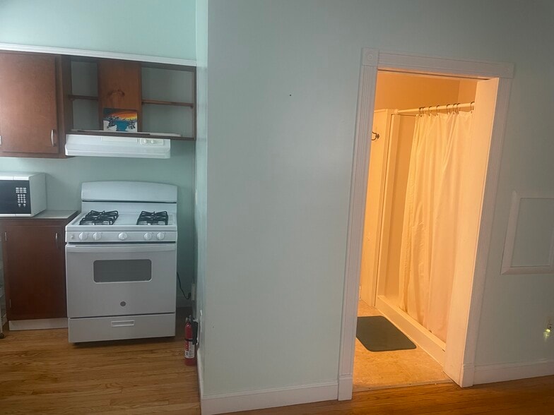 Kitchen with bathroom entrance - 156 Main St