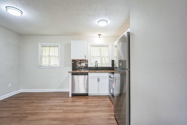 Building Photo - 4BR Brick Ranch with Upgrades & Room to Feel at Home!