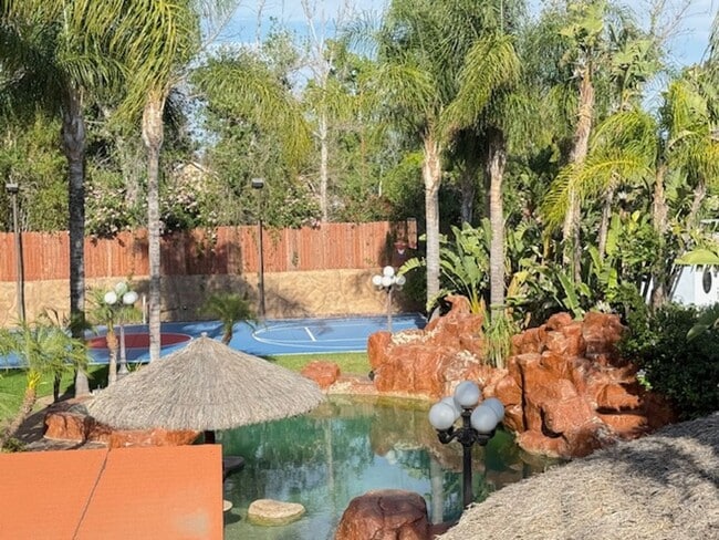 Building Photo - Gated estate with a backyard oasis