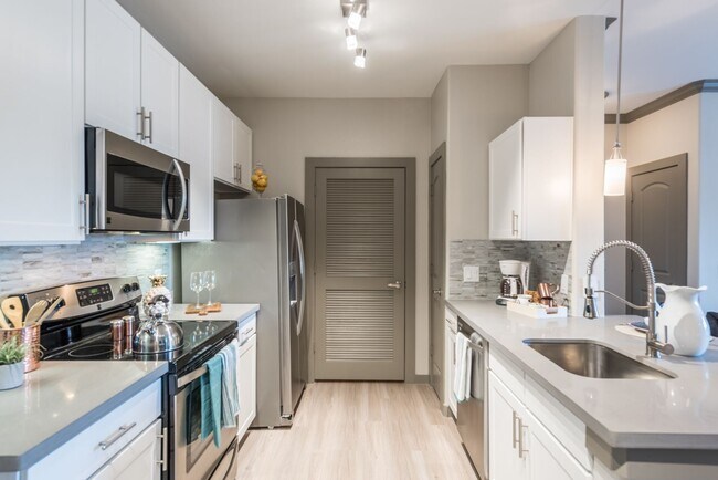 Building Photo - Elevated Lifestyle, With 1 Month Complimentary Rent!