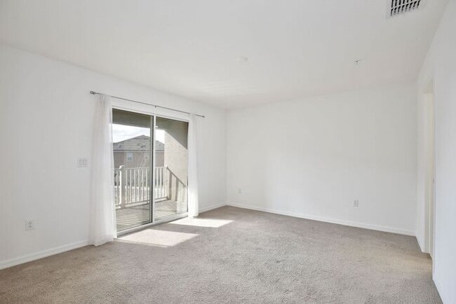 Building Photo - Luxurious 3/2.5 Modern Townhome with a Private Balcony and a 2 Car Garage in the Exclusive Gated ...