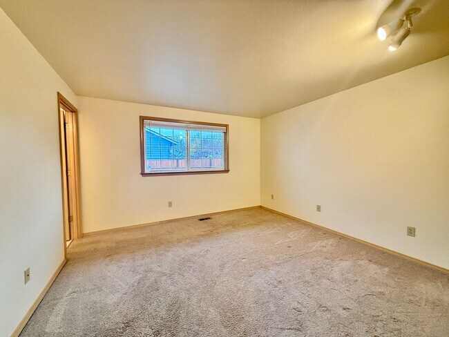 Building Photo - Sunny Rambler on Corner Lot with Large Fenced Yard & Deck