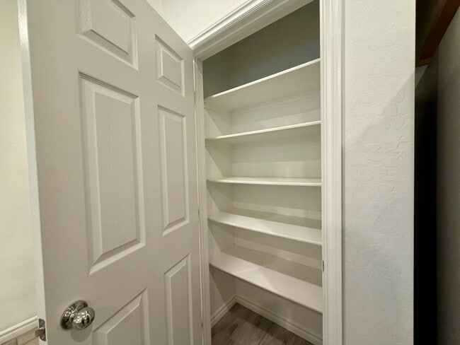 Building Photo - GATED 3 BED 2.5 BATH TOWNHOME WITH 2-CAR GARAGE, COVERED PATIO & COMMUNITY POOL