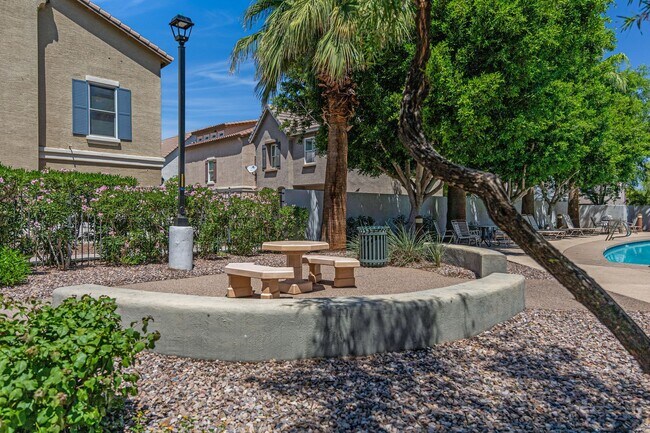Building Photo - Modern Tri-Level Townhome in Copper Leaf C...
