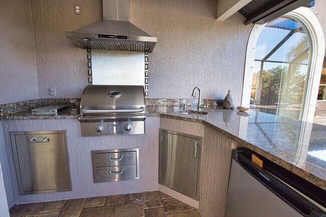 Building Photo - Luxury Home with Saltwater Heated Pool, Spa & Spectacular Golf Course Views, and includes Social ...