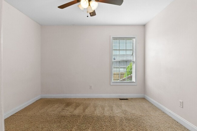 Building Photo - Charming 3BR Brick Home with Private Yard ...