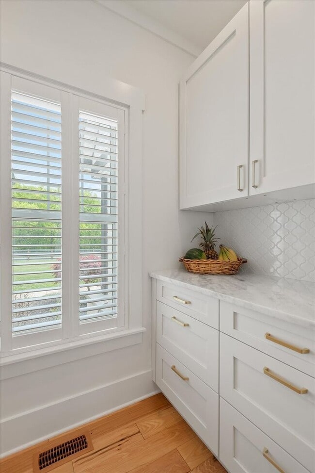 Building Photo - unning custom-built home on a full acre in...