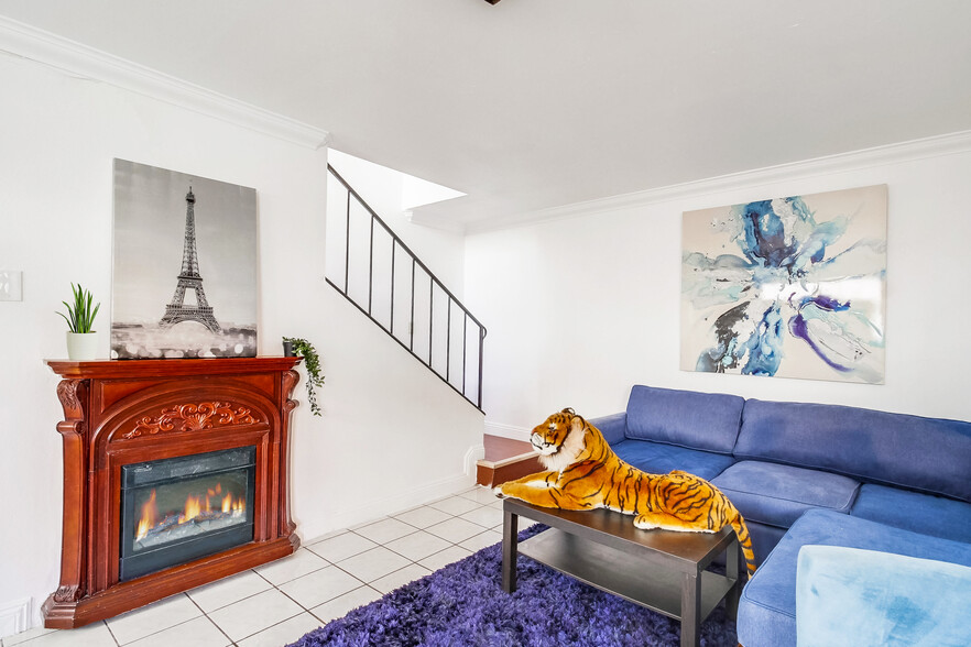 Gather around the fireplace and share cozy moments w/ friends and family - 2304 E 14th St