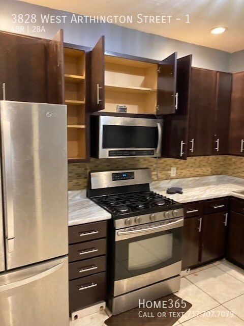 Building Photo - Stunning 4 Bedroom, 2 Bath Duplex