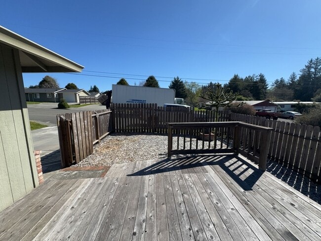 Building Photo - Newley updated 3-bedroom home features fenced yard, garage, and covered patios!