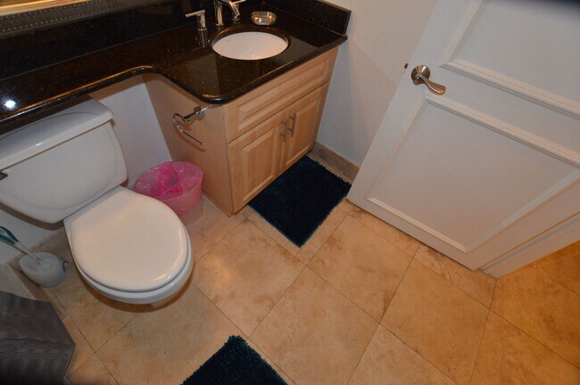 Building Photo - Charming Furnished Studio with Large Patio...