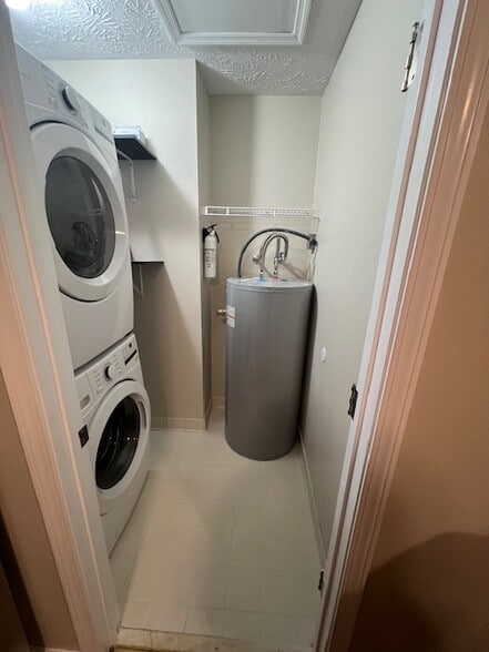 Laundry room with new LG full-sized washer and dryer - 100 Twin Acres Dr