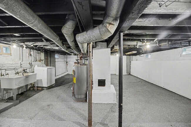 Building Photo - Updated First-Floor 2BR with Garage Parking and On-Site Laundry