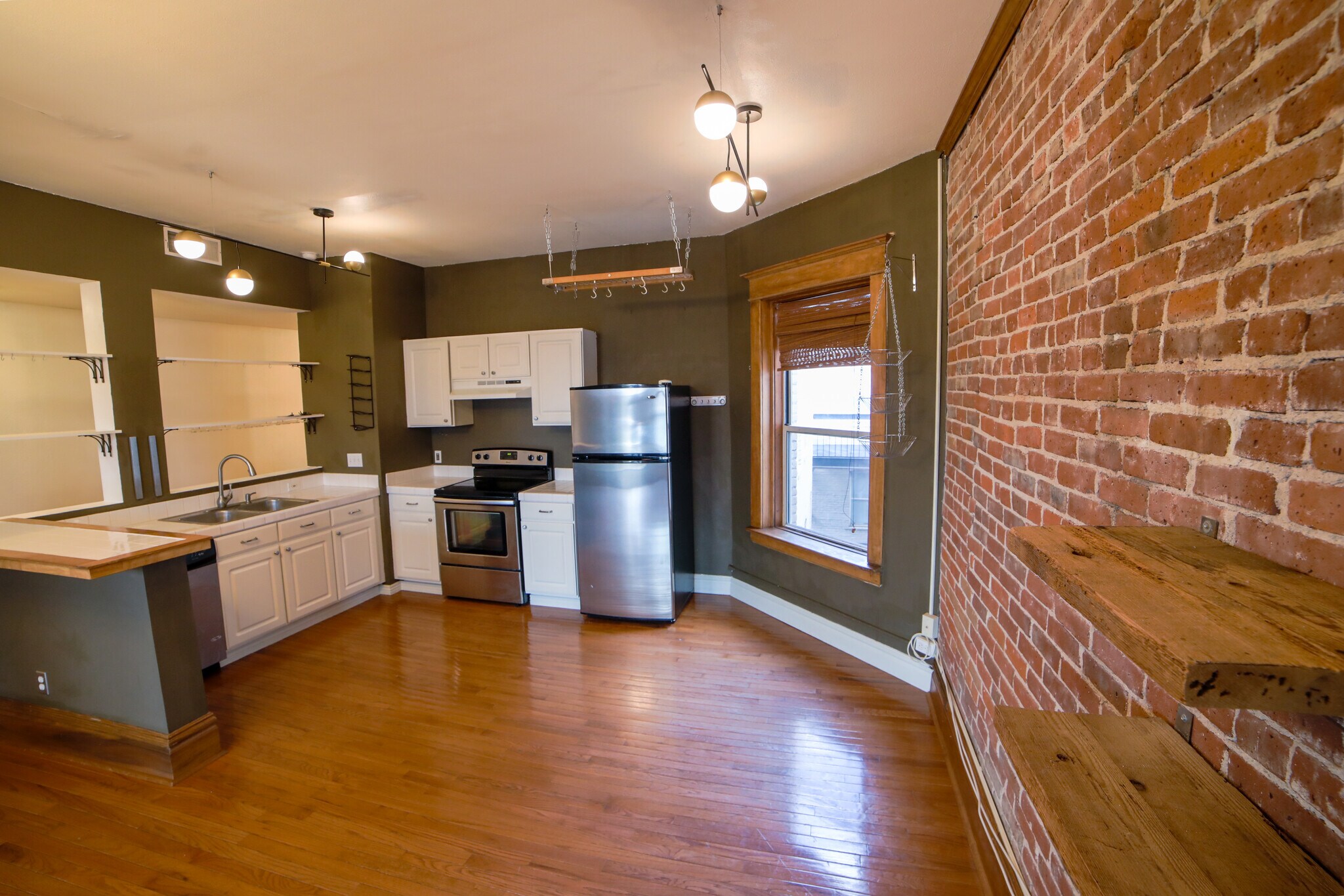 Building Photo - 1210 E Colfax Ave