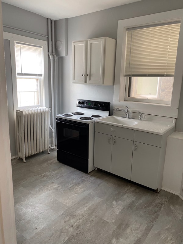 Building Photo - 117-129 N 2nd Ave E