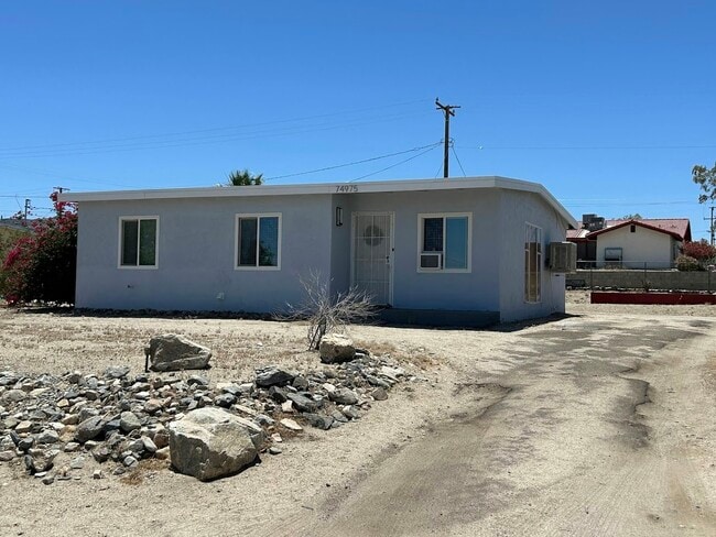 Building Photo - 74975 Serrano Dr