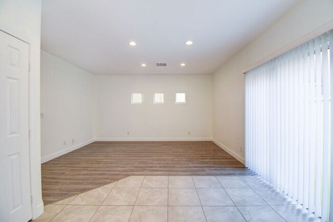 Building Photo - Great home with 4 bedrooms, 2.5 baths. New Floors Paint and Countertops.